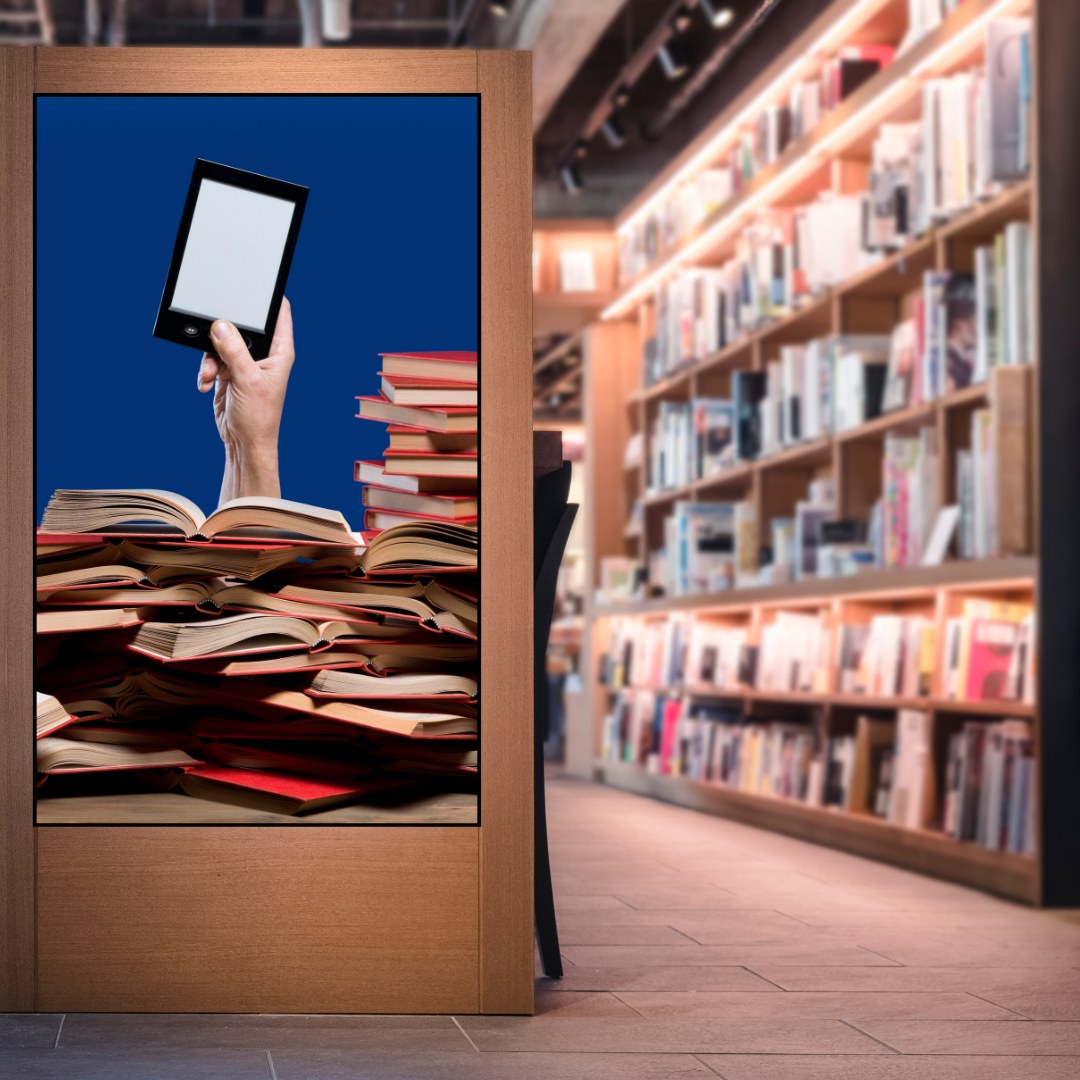 Illustration: a hand holding an e-reader above a pile of books, next to library shelves