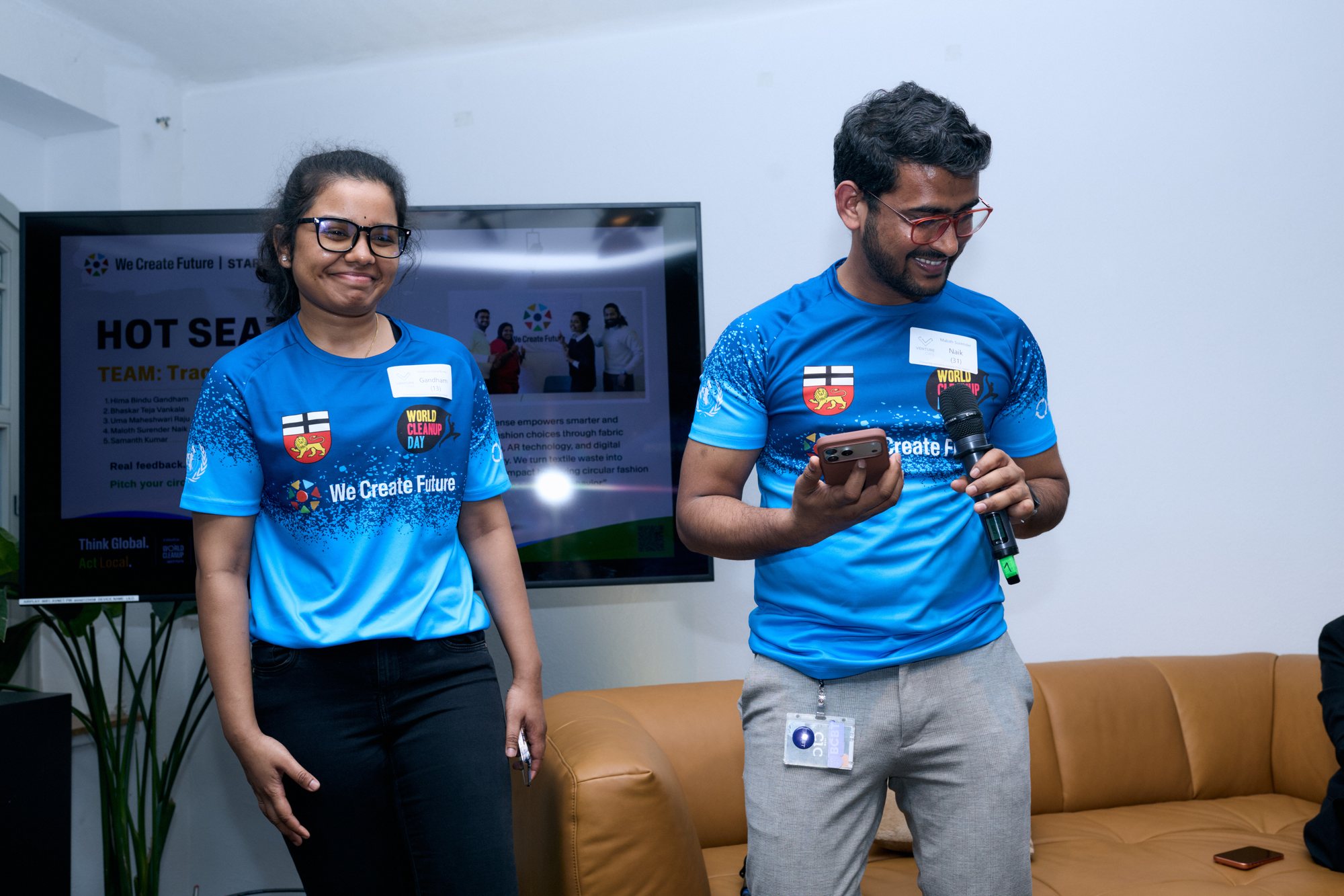 A team in We Create Future shirts pitching in the Hot Seat
