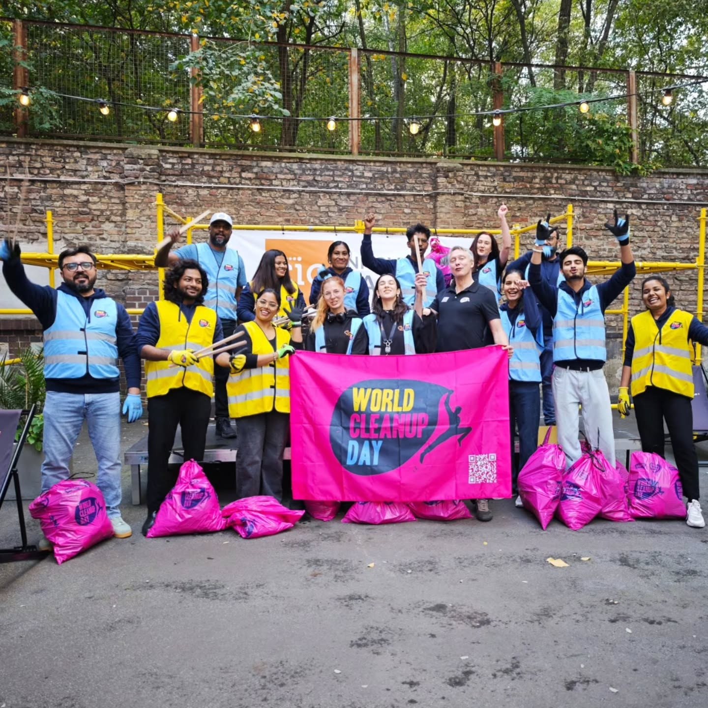 Participants of World Cleanup Day 2026 at BCBT with the World Cleanup Day banner in the CIC Berlin courtyard